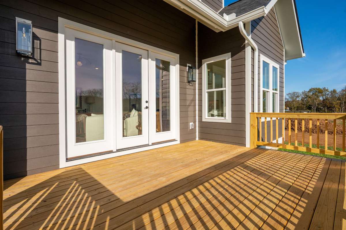 Photos  of Model Home. Floor plans and features may vary.