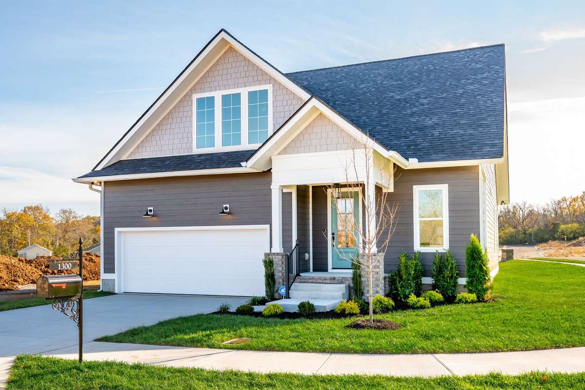 Photos  of Model Home. Floor plans and features may vary.