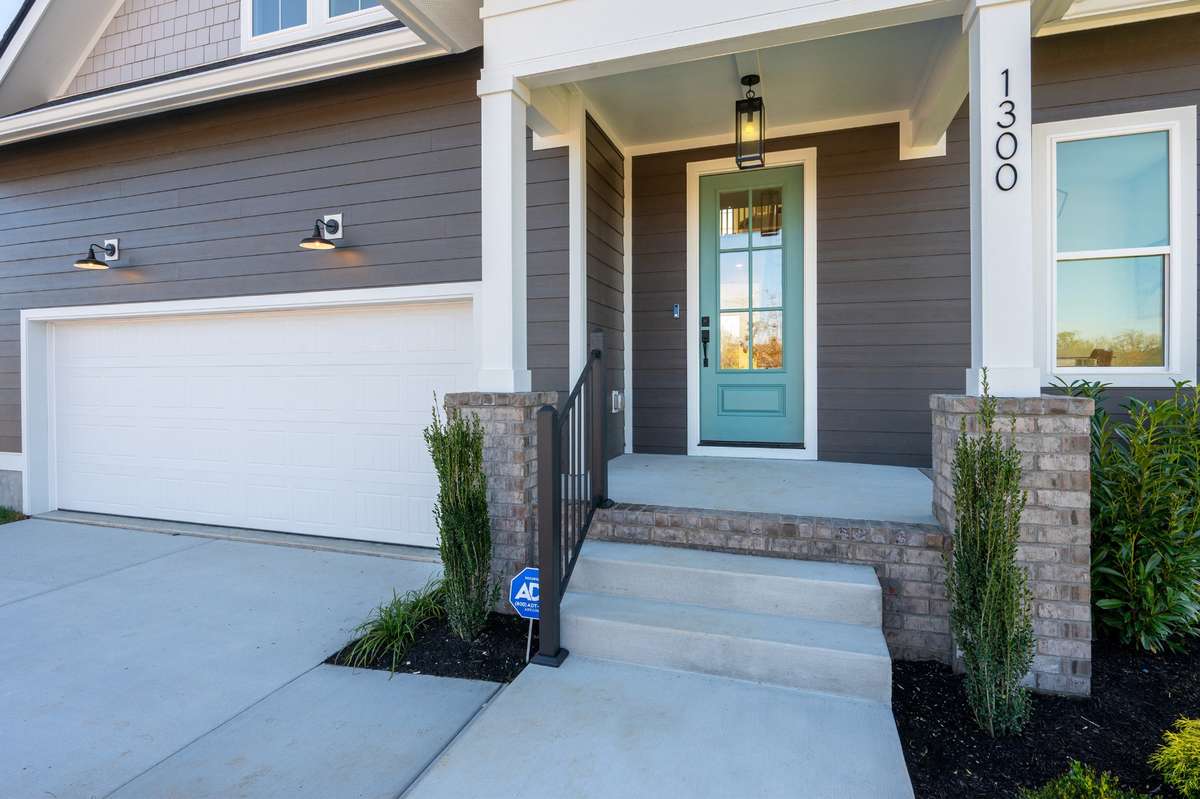 Photos  of Model Home. Floor plans and features may vary.