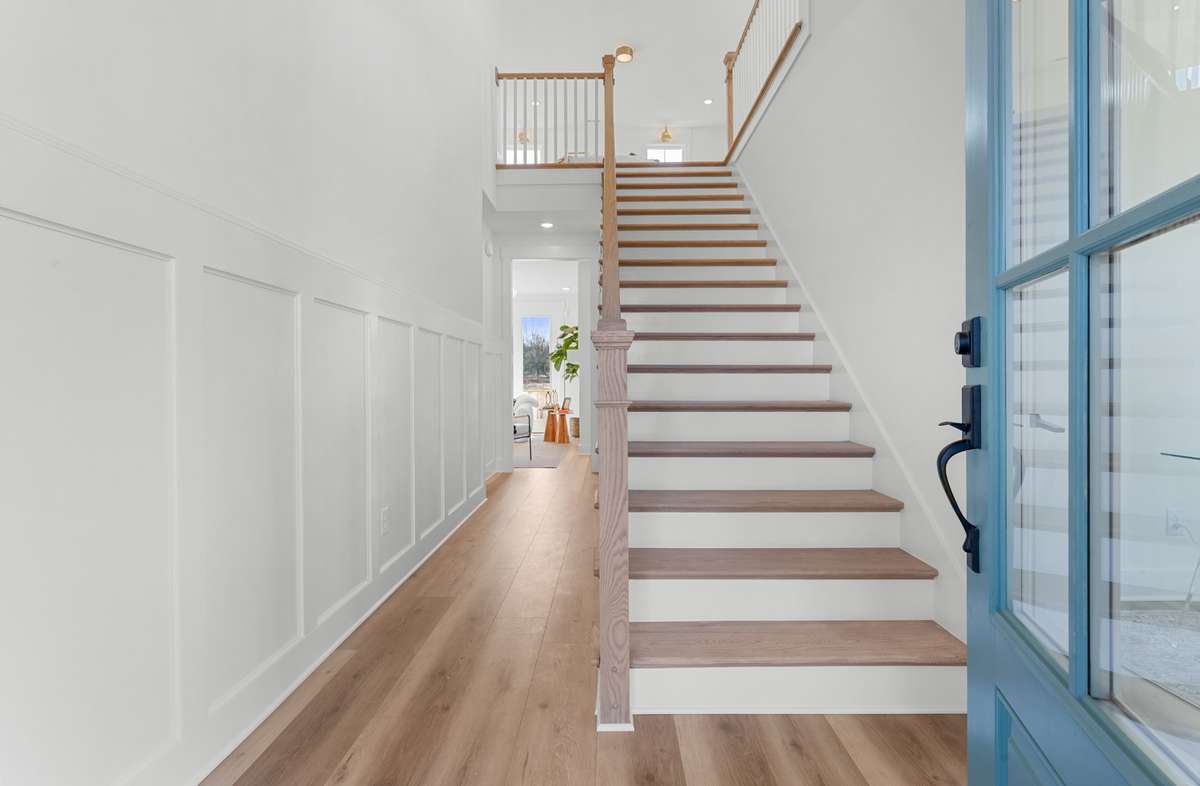 Photos  of Model Home. Floor plans and features may vary.