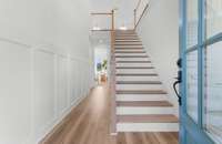 Photos  of Model Home. Floor plans and features may vary.