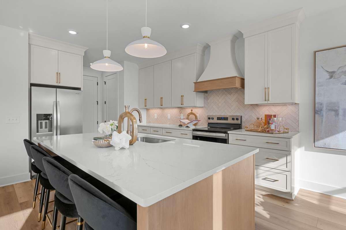 Photos of Model Home. Floor plans and features may vary.