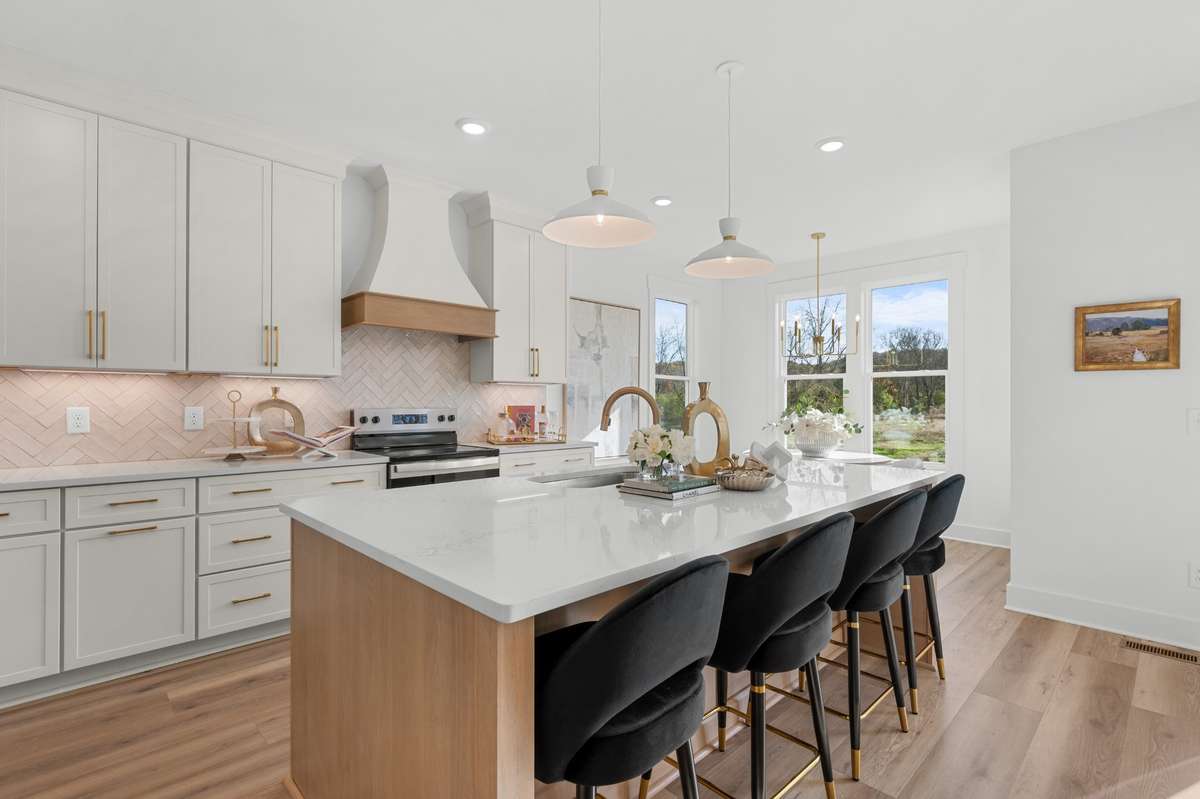 Photos of Model Home. Floor plans and features may vary.