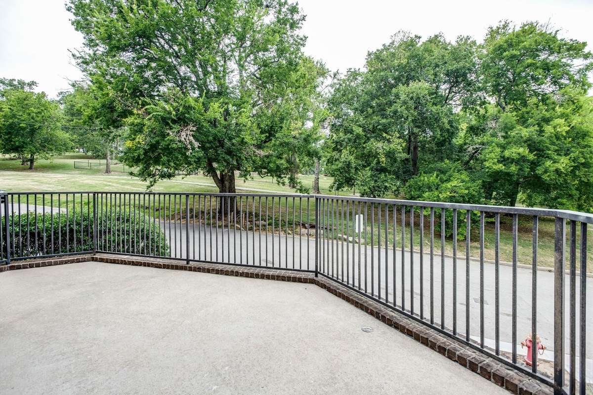This front park facing patio off of the Living Room has room for seating, umbrella and a BBQ making it the go to entertainment area.