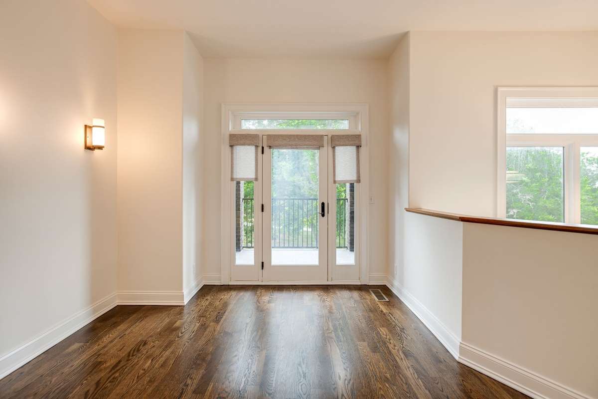 This second floor landing flex space, depending on your lifestyle needs can be used as an office, reading nook or playroom.  You will love the direct access to the covered balcony to enjoy fresh air and natural beauty.