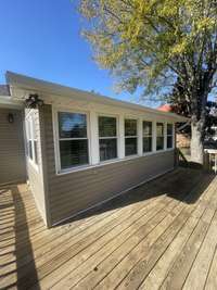 A LOOK AT THE SUNROOM FROM OUTSIDE.