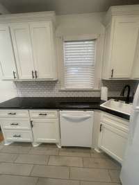 THE KITCHEN IS WELL-APPOINTED FOR EASY ACCESS AND FEWER STEPS.