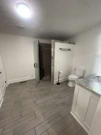 HERE WE HAVE THE 2ND FULL BATH - VERY LARGE AND ACCOMMODATING