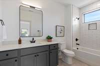 Ensuite full bath adjoins each bedroom.