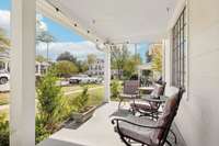 The covered front porch is cool, breezy and inviting.