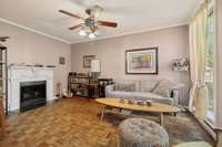 So much character in this charming den rare patterned hardwood floors!