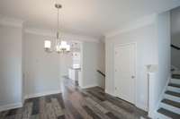 Formal Dining - stairs going up/down - Kitchen