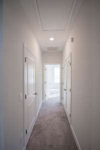 3rd floor hallway with linen closet and laundry