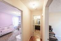 Now let's go across the way to check out the other two bedrooms!