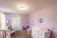 This room boasts lots of space for furniture or to play. You can see it works perfect for a growing little one!