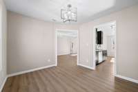 Formal Dining Room looking into Kitchen and Living Room