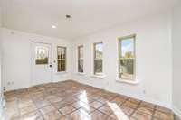 Sunroom with loads of natural light and 2 separate entrances