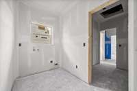 Utility Room on Main Level with Door Accessing Master Bedroom Closet!