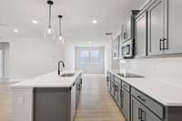 Darlington kitchen and dining view. Photos are of similar home, same plan. Colors, interior selections, elevations and upgrades may vary.