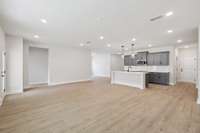 Darlington kitchen and living space. Photos are of similar home, same plan. Colors, interior selections, elevations and upgrades may vary.