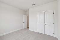 Darlington bedroom 3. Photos are of similar home, same plan. Colors, interior selections, elevations and upgrades may vary.