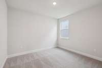 Darlington bedroom 2 Photos are of similar home, same plan. Colors, interior selections, elevations and upgrades may vary.