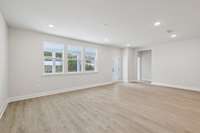 Darlington great room.  Photos are of similar home, same plan. Colors, interior selections, elevations and upgrades may vary.