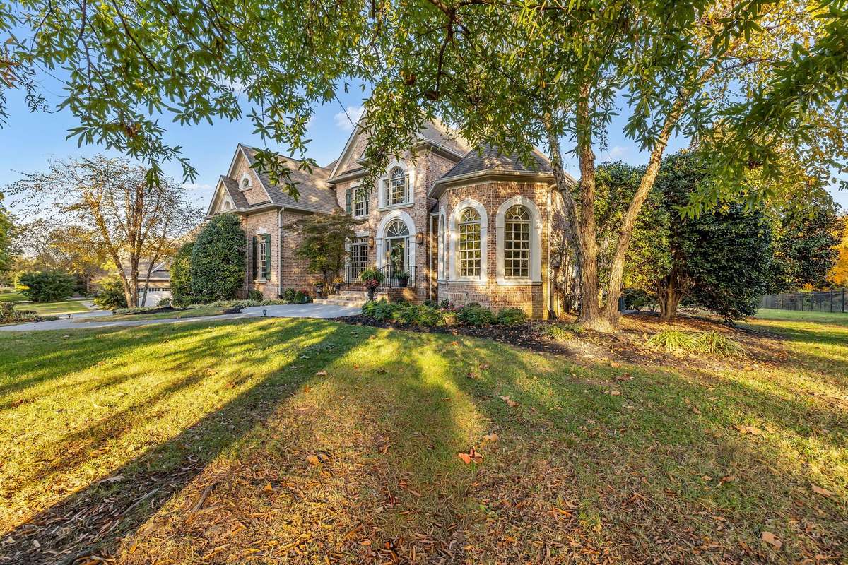 Classic symmetry and refined details showcase the home’s exceptional curb appeal.