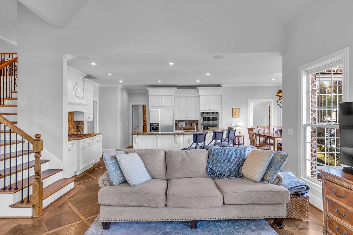 Spacious family room connects effortlessly to the kitchen, ideal for casual living and conversation.
