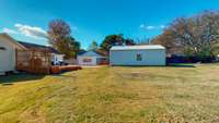 View of backyard to the Workshop/Garage.