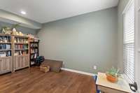 Flex space you could use for a home gym, home schooling, or toy room for kids!