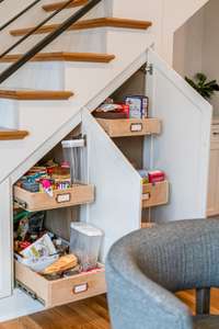 The cabinets under the stairs have pull out drawers?