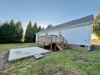 Deck as well as a concrete patio area