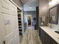 So many custom features in this Primary Bathroom! Double sink, custom closets, custom extra large shower!