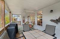 Access to the covered deck from the kitchen and primary bedroom.  Terrific outdoor living space