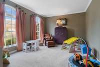 Front living room is great flex space. Currently used as a playroom . . . also would make a great office, library, music room, whatever you need!