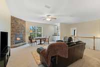 Wonderful upstairs bonus room.  Wet bar, stone gas-log fireplace and ceiling fan. Bring the big screen and all the games for family time