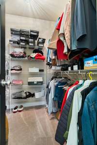 One of the two master bedroom walk-in closets
