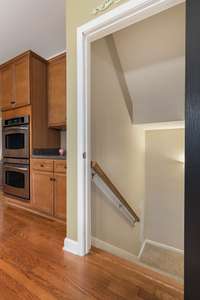 Main level door in the kitchen that goes straight to basement rec room