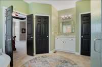 Another view of the primary bathroom with the second vanity and private water closet