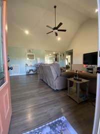 Large family room (20x15) with beautiful vaulted ceilings welcome you with open and airy arms