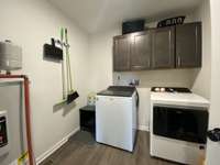 Separate laundry room with additional storage (5x7)