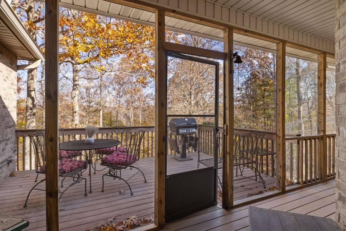 Screened Porch opens to deck.