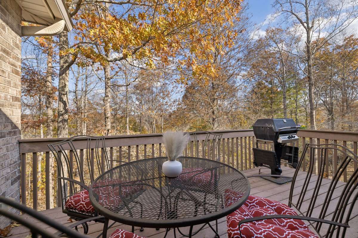 Built in grill on deck, overlooking the beautiful wooded hillside!
