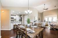 The main living spaces of this home are thoughtfully designed with an open floor plan, creating a seamless flow between the kitchen, dining, and living areas.
