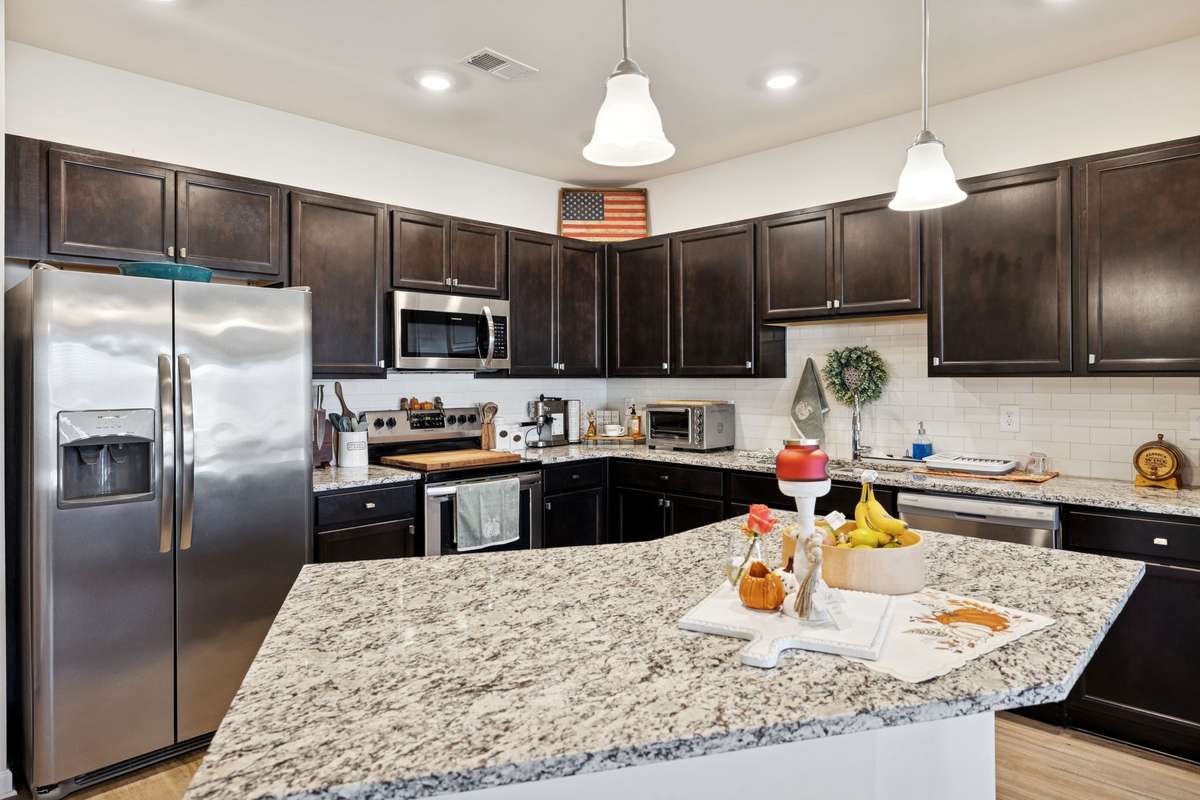 Kitchen also offers extensive cabinet space and dark wooden cabinets.  2605 Sherman Way Columbia TN 38401