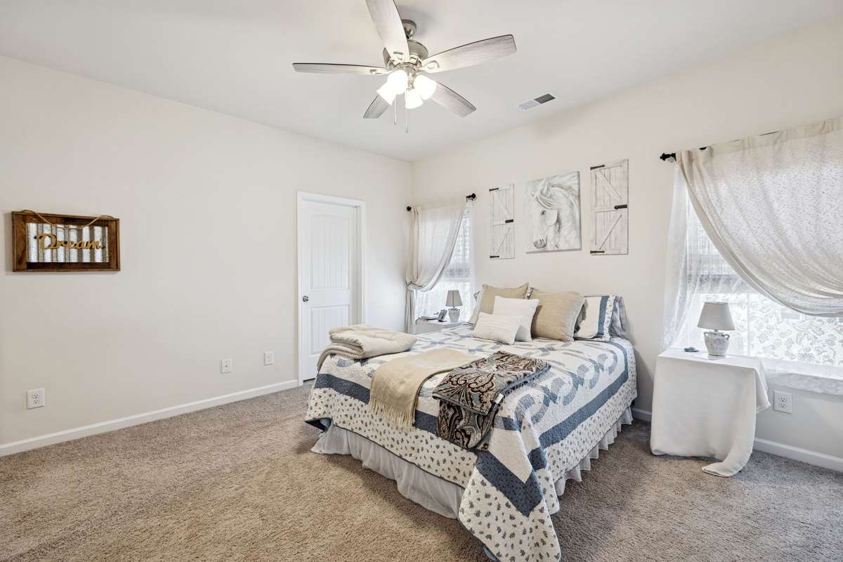 Primary bedroom also provides over head ceiling fan and clean soft carpet.  2605 Sherman Way Columbia TN 38401