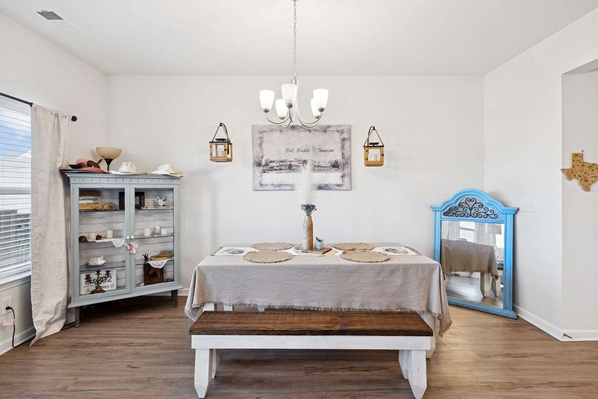 Dinning area offers overhead light fixture and flow seamlessly into your living room and kitchen.  2605 Sherman Way Columbia TN 38401