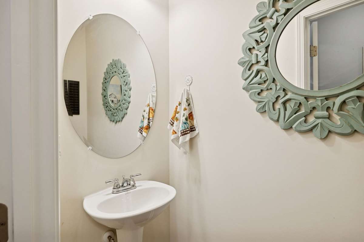 First floor half bath with pedestal sink.  2605 Sherman Way Columbia TN 38401