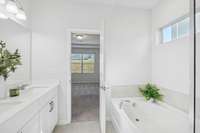 Relax in this beautiful garden tub!